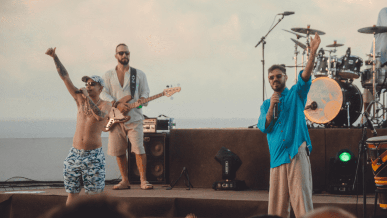 https://www.pretessencias.com.br/outros/planta-e-raiz-e-mc-hariel-unem-vibe-do-reggae-funk-e-trap-na-alto-astral-passa-a-bola/